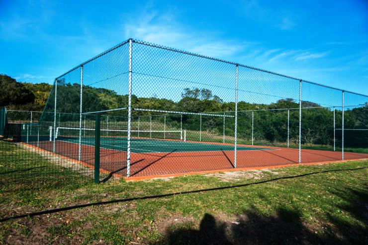 The tennis court is one of the incentives which drew Port Elizabeth businessman Gavin Hogg and his wife to the Sardinia Bay Golf & Wildlife Estate